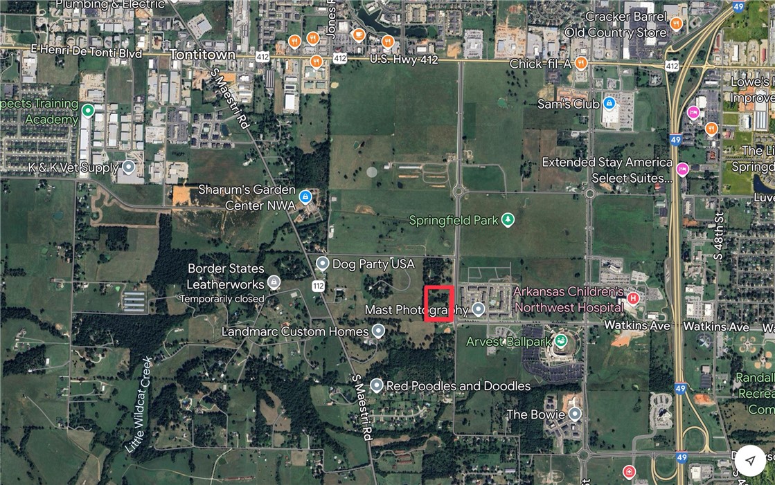 BACK ON MARKET THROUGH NO FAULT OF SELLER.....This property is at the corner of Watkins and S. 64th near NWACC and Arvest Ball Park and the heart of the Springdale Care Corridor. Property is currently zoned Agri but is perfect for multi-family or commercial. This area is quickly developing, so do not miss your opportunity to get your hands on this wonderful property.  With easy access to I-49 (2min) and 412 (1 min), you have quick access to everything NWA. Buyer will be responsible for zoning change.
