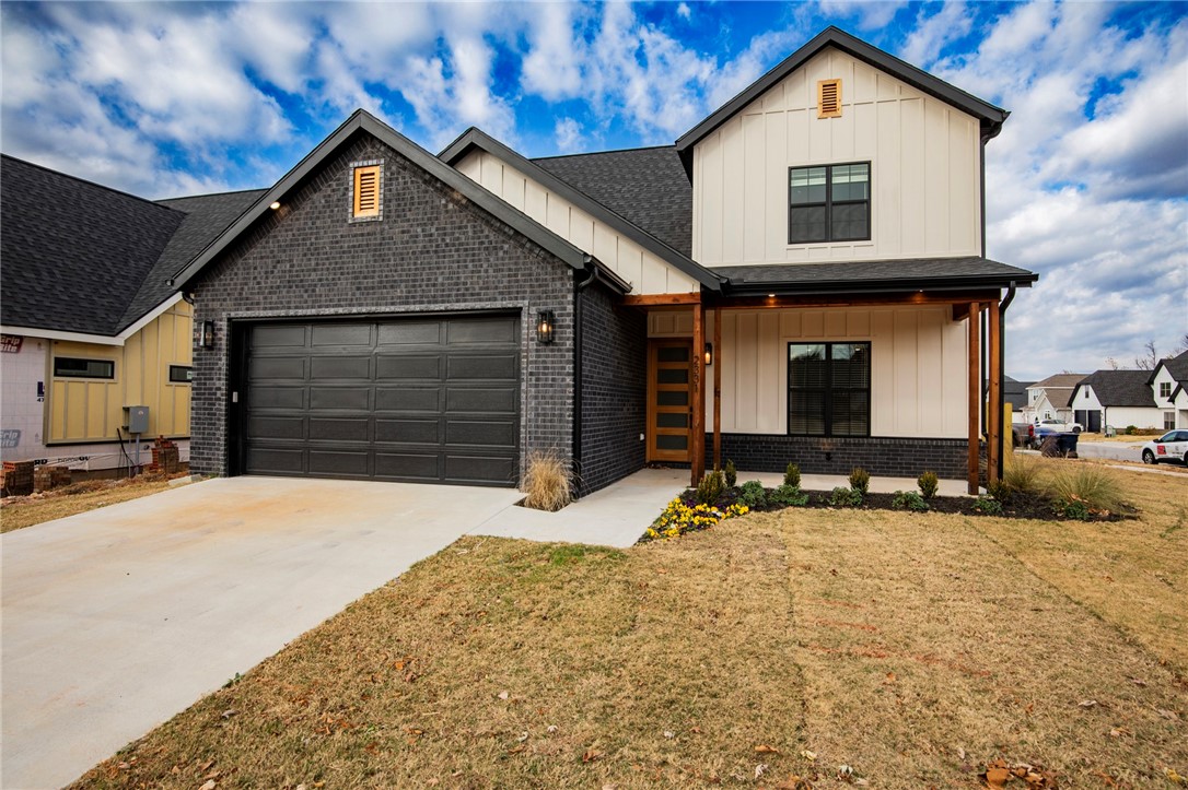 $3500 preferred lender credits! Fabulous new construction near the Promenade and Rogers Aquatic Center!
These elevated homes showcase stunning design with white oak flooring, high-end countertops, and designer tile selections throughout. Vaulted ceilings and floor-to-ceiling cabinetry create a grand, open feel, while the butler’s pantry, with counters and outlets, keeps your gorgeous kitchen clutter-free.
The primary suite is a true retreat, featuring a spa-like bath with a frameless glass shower wrapped in floor-to-ceiling tile, and dual vanities. The spacious walk-in closet offers custom shelving, drawers, and hanging space for ultimate organization. Upstairs, you’ll find three additional bedrooms and a full bath with the same elevated finishes, plus one room easily doubles as a bonus living area.
Outside, enjoy full sod, front landscaping, and a private backyard with a gate and wood privacy fence!