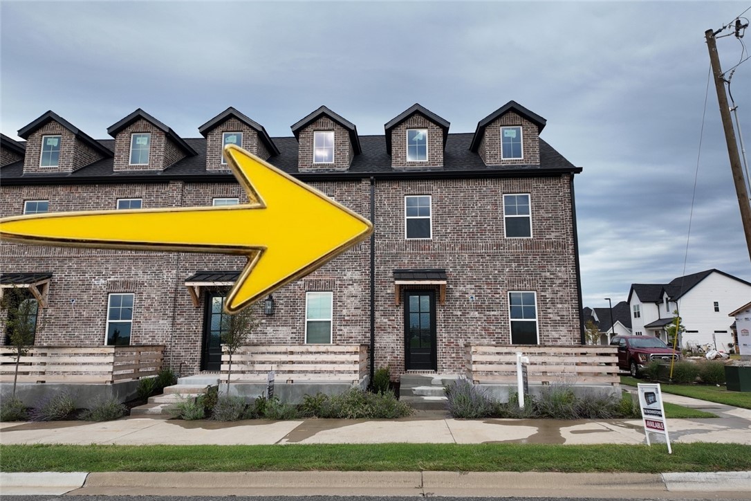 Introducing the Brownstones at Bellview Place, a boutique community thoughtfully designed for modern living and long-term value. These 3-bedroom, 2.5-bath, two-level residences offer approximately 1,841 square feet of well-planned space with timeless architecture and quality finishes throughout. Construction is in the final phases, with interior completion underway, making these homes nearly move-in ready. Bellview Place is a walkable, community featuring cottage and townhomes, brick paver streetscapes and a future bark park, enhancing both lifestyle and neighborhood appeal. Ideally located just minutes from Pinnacle Hills Promenade, providing convenient access to shopping, dining, entertainment, and major employers. Seller is offering a $10,000 flex credit, which may be applied toward financing costs, closing costs, or a move-in package including refrigerator, washer, and dryer (buyer choice). Limited availability in a rapidly growing area, schedule your private showing today.