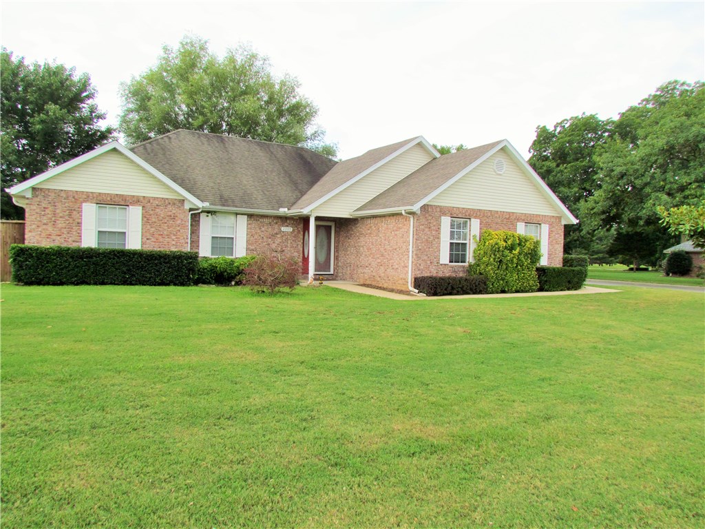 Welcome to your new home, this beautiful home sits on over a 1/2 acre corner lot, 3 bed, 2 bath, spacious living room featuring cathedral ceiling,crown molding, gas log fireplace with blower. Large kitchen with eat in dining open to living area. Enjoy outdoor living in your huge privacy fenced backyard, with covered porch, the "He" shed is 16x12 & the "she" shed is 11x24 both w/elec. Many Updates! Located close to white river, Lake Sequoyah. 10 miles to I-49, U of A & Downtown Fay. 2-10 Home Warranty