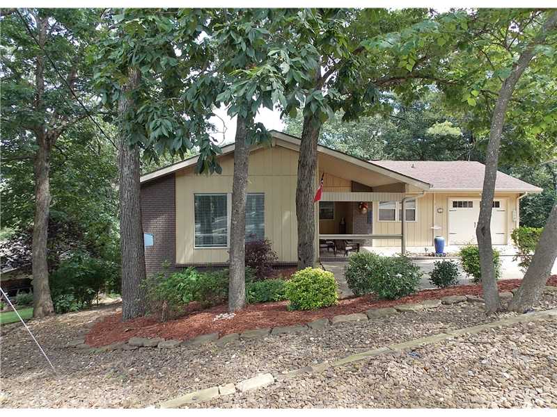 Enjoy Lake Avalon from this amazing 2 level lake front home with great views.  Updated with 2 outdoor decks, sun room, a open floor plan, large windows, a custom landscaped back yard.  This home also offers a private dock. New Hardwood Floors, Fresh Paint,Beautiful Light Fixtures and Much More. The Lake Awaits your Visit. Come See & Stay Awhile.