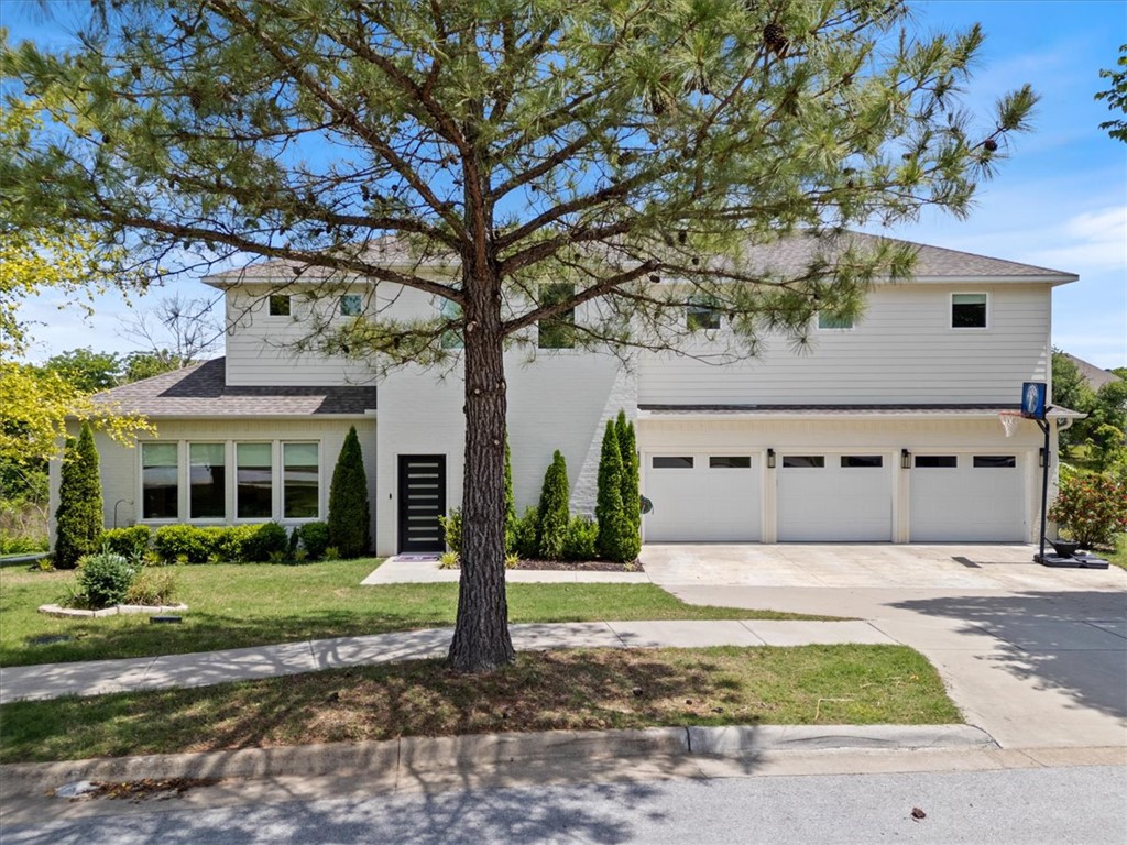 What a find! Gorgeous home sitting right on Crescent Lake in South Fayetteville is the perfect blend of style and function. Directly across from the clubhouse of Stonebridge Meadows golf course you'll find this spacious 4 bedroom, 3.5 bath with bonus/media room, 3 car garage and high-end finishes throughout. Open kitchen/living area with custom fireplace, built ins & large windows creates a stylish, inviting feel. Half bath, pantry & laundry with extra storage closet are conveniently located. Sleek master bath with oversized shower and awesome lighting. Jack & Jill setup upstairs along with a private guest suite at the end of the hall. Wine fridge & ice maker in media room provide the perfect spot to relax. Enjoy peaceful sits or fire up the grill on the back deck overlooking the lake, which has a community dock for fishing and a gazebo. Drop a kayak in from your back yard! Morning or evening strolls around the neighborhood and golf course offer scenic views. All of this just 10 minutes to downtown Fayetteville.