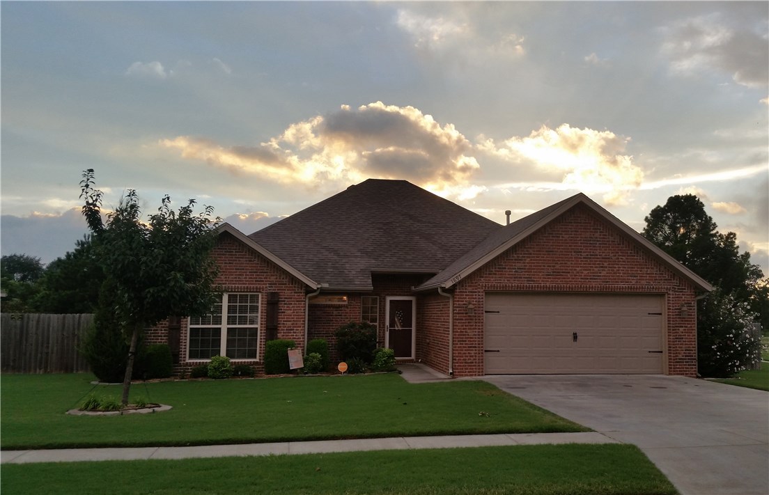 This beautiful all brick 3 bed 2 bath home sits on a corner lot. It offers a large open living room, 10 foot ceilings, recessed lighting, crown molding, hardwood/tile throughout.  Spacious master bedroom has tray ceilings and two walk-in closets.  Master bath has double sinks, separate shower and soaking tub.  Large eat in kitchen has granite countertops and stainless steel appliances. Exterior has landscaped lawns, storage shed, and many extras. This home offers much much more!