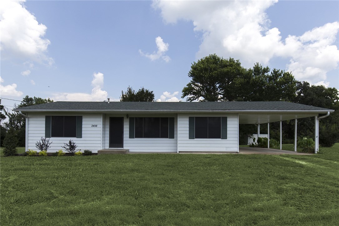 Charming one level home in East Fayetteville.  Features include the original, recently refinished hard wood floors; a newer roof, A/C, water heater, and furnace; and new paint. The home also includes gutters, a detached garage, and a large yard.