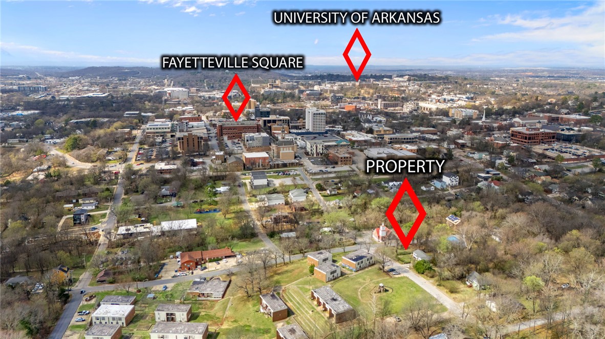 Great opportunity to own two RMF-24 lots near downtown Fayetteville. All utilities are at the street and has city approval for a lot split. Perfect site for multi-family or residential within walking distance to everything downtown has to offer. Existing house plans available with accepted offer.