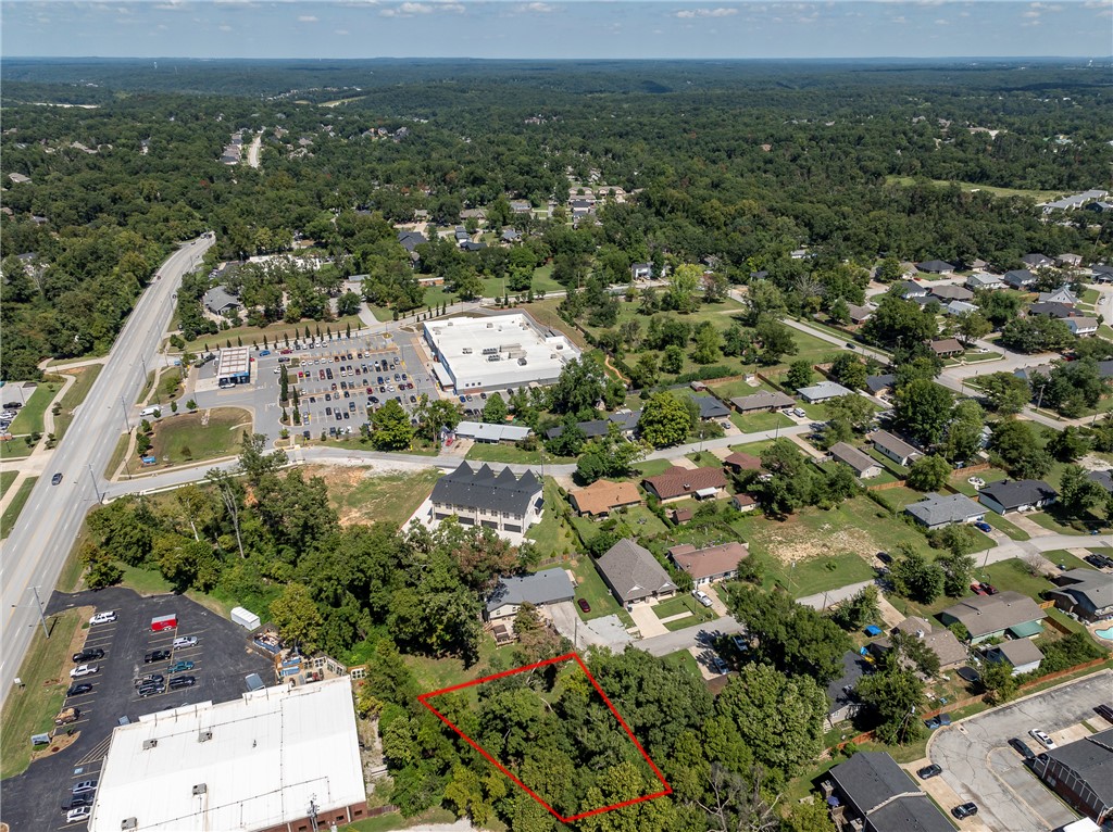 Build your dream home on this beautiful lot ideally located just minutes from downtown Bentonville. Nestled in a prime area, this property offers the perfect blend of convenience and tranquility. Enjoy easy access to shopping, dining, trails, and all the charm Bentonville is known for, while still having a peaceful place to call your own. Whether you’re envisioning a custom home or an investment opportunity, this lot provides endless potential. Surrounded by natural beauty and established growth, it’s a rare chance to own in one of Northwest Arkansas’s most desirable locations. Don’t miss the opportunity to create something special in a setting that truly feels like home.