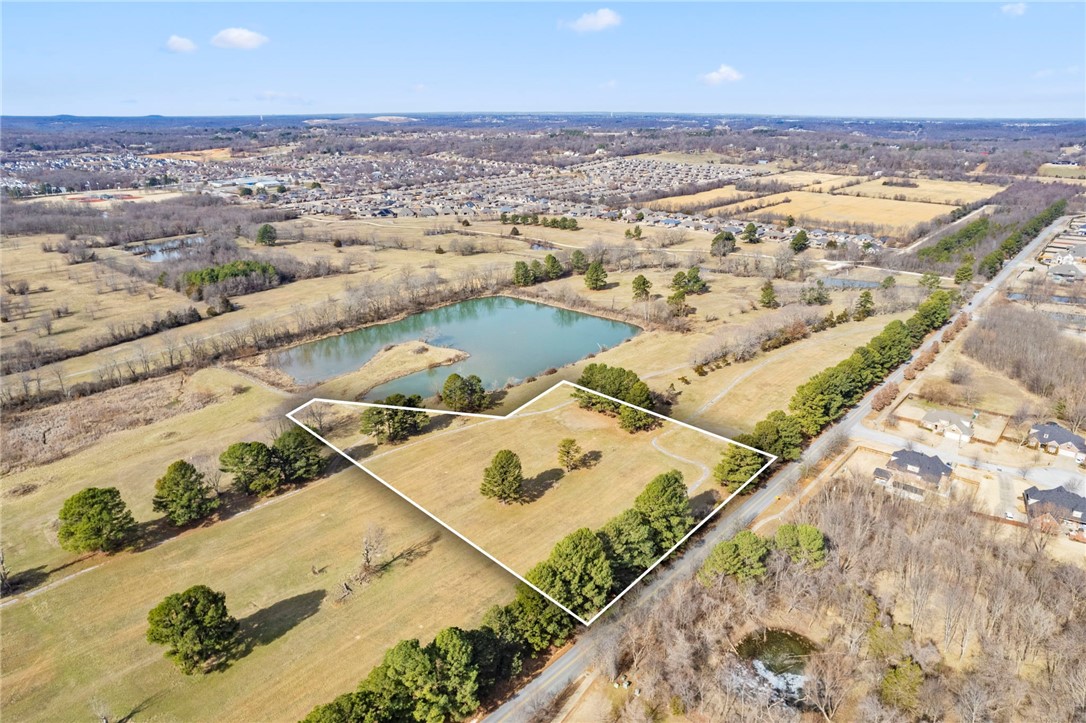 Exceptional commercial development opportunity, in one of Fayetteville’s most desirable growth corridors, is conveniently placed between I-49 and Hwy 112, with high visibility, easy access to major roadways, and proximity to growing residential and business communities -  ideal for a variety of commercial uses. With flexible parcel sizes and multiple development possibilities, this site is perfect for business expansion, investor portfolios, and commercial developers looking for their next big project. Zoned Mixed-use – Approved for retail, office, restaurant and housing development. City water, sewer, and electric available. Key Highlights include its strategic location providing excellent regional access. High-growth area  surrounded by expanding residential and commercial developments. Ideal for retail centers, office buildings, restaurants, or mixed-use. Ready for development with access to essential infrastructure.