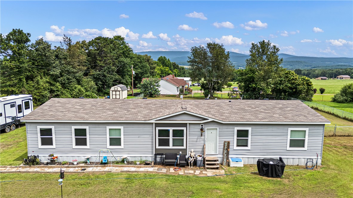 Welcome to this beautiful 2 year old manufactured home that still feels brand new! Offering 4 bedrooms and 2 full bathrooms, this home features a spacious and inviting open concept layout that seamlessly connects the kitchen, dining area, and living room. Perfect for entertaining or everyday family living.
The bright, modern kitchen is the heart of the home, while the generous living spaces provide plenty of room to relax and gather. All four bedrooms are well-sized, giving everyone their own space. This home is sure to please!