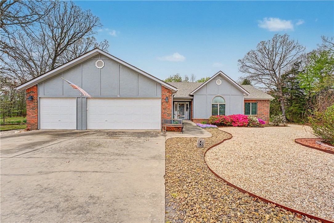 Discover a rare opportunity at 16 Saint Andrews Circle in beautiful Bella Vista! This exceptional property sits on a hard-to-find level lot, offering ease of access, usability, and everyday convenience—something truly uncommon in this area. Even more impressive, an additional lot is included, providing extra privacy, space to build, or a valuable investment opportunity.

Surrounded by the natural beauty Bella Vista is known for, this home offers a perfect blend of comfort and potential. The level setting makes outdoor living, entertaining, and enjoying the surroundings effortless. Whether you're relaxing on the patio, hosting family and friends, or planning future expansion, this property offers flexibility to fit your needs.

Conveniently located near golf courses, biking trails, and all the amenities Bella Vista has to
offer, this home stands out as a unique find. Don’t miss this rare combination of a level lot and
extra land in Northwest Arkansas!