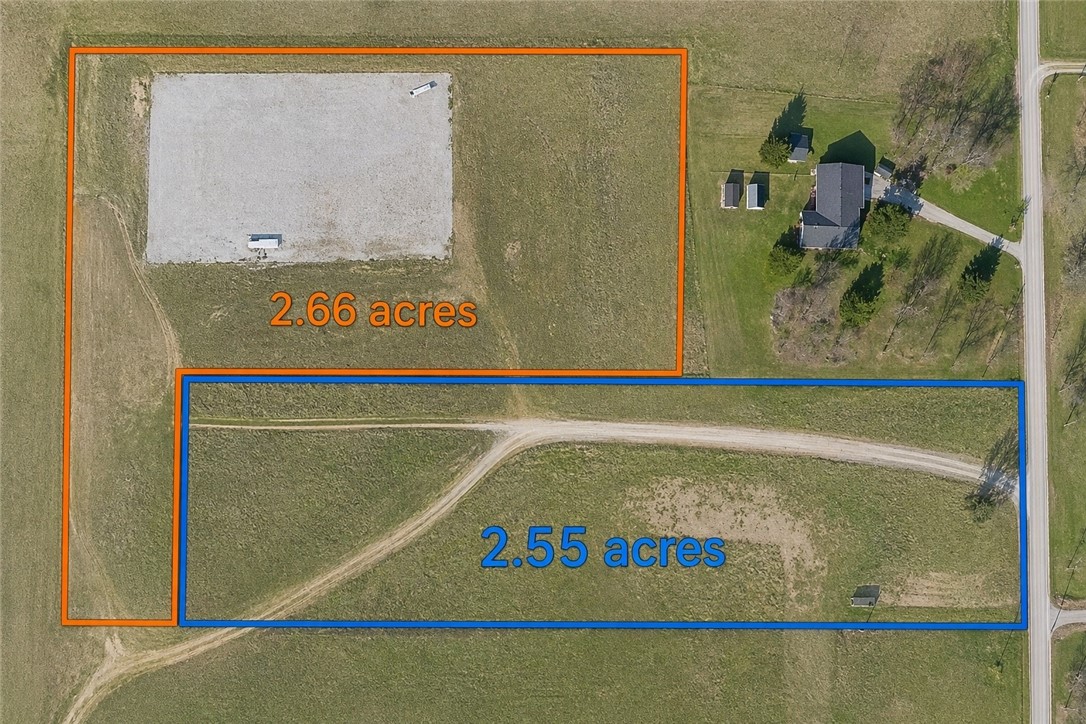 Enjoy the freedom to build on this 2.55 flat lot located outside city limits.  With road frontage and no deed restrictions, this property offers flexibility and convenience. Mobil homes allowed, Just 10 minutes to town .