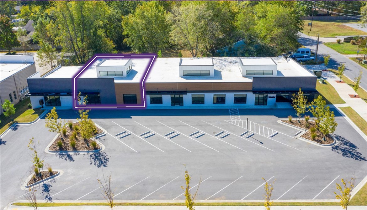 Office space with conference room, kitchen, and bathroom with shower.  Prime office location in the heart of downtown Bentonville on the corner of S Main Street and SE 10th Street.  Positioned just one block from the 8th Street corridor with strong connectivity.  Surrounded by walkable amenities including dining, retail, and entertainment.  On-site surface parking.