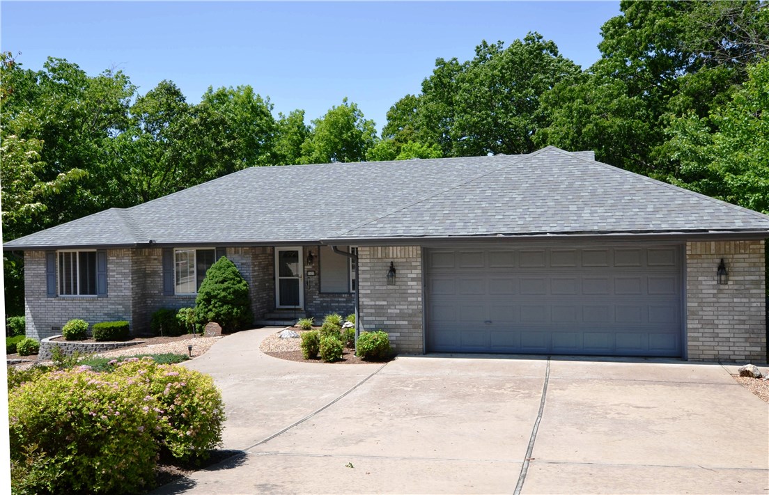 Beautiful one level home in upscale Highlands cul-de-sac convenient to Hwy 71 also to new 49 bypass.  Very well maintained home, easy care landscaping, back side is common property will remain private.  Circular drive, 2 1/2 car garage, 3 bed, 2 1/2 baths, 20 x 12 bonus room & 16 x 14 shop not included in sq. ft. coffered ceilings in bedrooms and vaulted ceilings in living room & kitchen, huge utility room, loads of cabinets & storage space. New roof in 2016. 3rd bedroom no closet easy to fix.  Sewer 2017