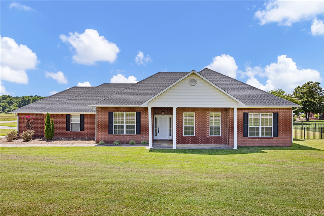Welcome home to this beautiful 3-bedroom, 2-bath home offering just over 2,000 square feet in the desirable Chamberlyne Golf Course community! The oversized dining area could easily serve as a home office, playroom, or additional flex space to fit your family's needs. You'll love the open feel created by the 10-foot ceilings throughout the living areas and bedrooms, along with an abundance of natural light that fills the home. Step outside to the large, fenced backyard—perfect for family gatherings, entertaining, or relaxing outdoors. For added peace of mind, the roof is less than a year old. This home offers the perfect combination of comfort, functionality, and a fantastic location.