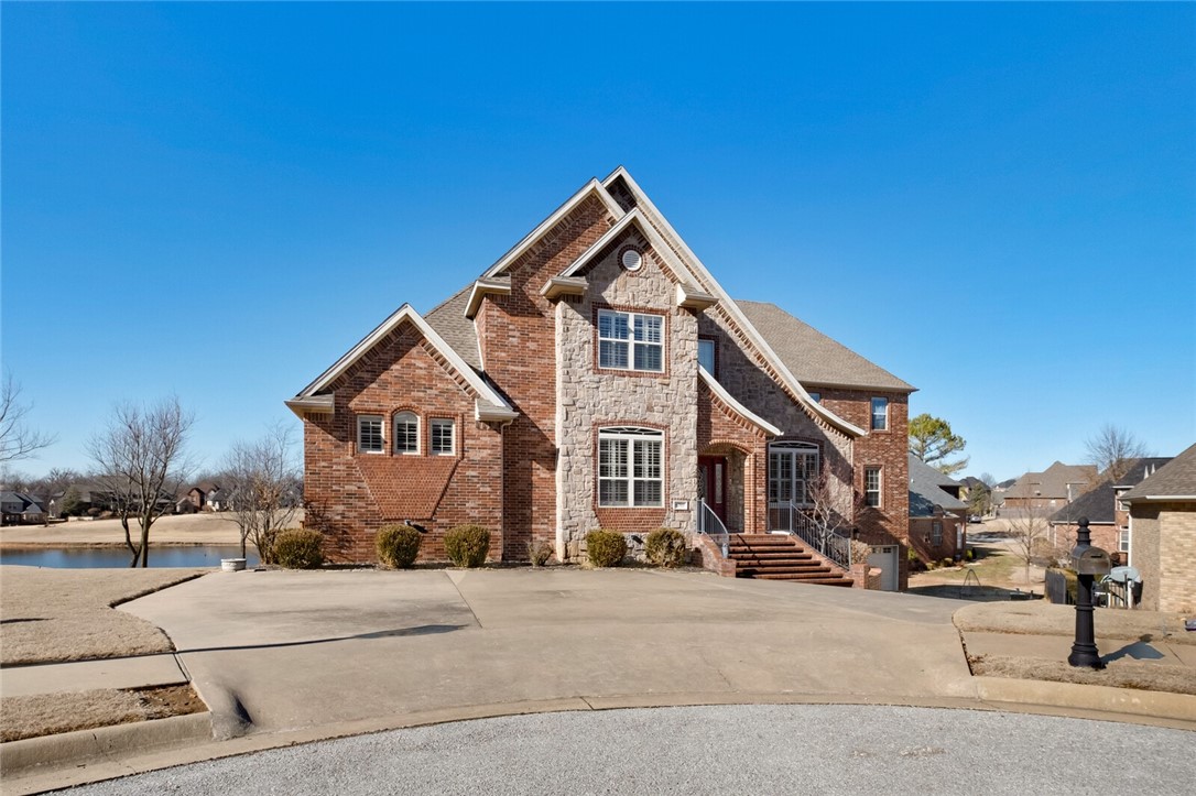 Immaculate 5 bedroom 3.5 bathroom Shadow Valley Estate home, located golf-front & lake front in a 2-home cul-de-sac w/ the best view in the neighborhood. Gorgeous views from almost every room in the home, the neutral palette of the home is a blank canvas for all of your design dreams. The main floor features a grand, eat-in kitchen w/ stainless steel appliances, 2 living rooms, formal dining, office, flex space & Primary suite where you can relax by the fire or in the luxury spa-like bathroom w/ his & hers vanities & private closets. Upstairs are 4 bedrooms each w/ private vanities & shared baths & over-sized bonus room. The finished, walk-out basement is the perfect workout room/game room. Outside are 2 decks, upper & lower, showcasing the spectacular lake/golf views & overlooking one of the larger Shadow Valley backyards that would be perfect for a pool!
