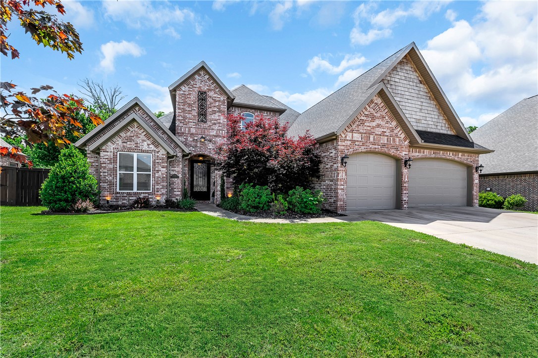 Imagine mornings picking fresh fruit from your own cherry, apple, or pear trees before walking to the community pool. Located in a quiet cul-de-sac close to downtown Bentonville and the new WalMart campus, this stunning 5-bedroom, 4.5-bath retreat offers the perfect blend of comfort and intentional living — a main-level primary suite for effortless everyday life, a home office, a bonus media room for family movie nights, and a covered patio with a brick firepit made for lingering evenings outdoors. Beautiful built-ins, a gas fireplace, and warm wood floors set the tone inside, while mature trees and full front-to-back irrigation complete the picture outside. Recent updates include a new roof, garage doors, and water heater (2024), carpet, upstairs paint, and microwave (2025), exterior lighting (2026), plus a new dishwasher and refrigerator that conveys — meaning you simply unpack and start living. Walkable trails, a playground, pavilion, and basketball courts round out this lifestyle-first community perfectly.