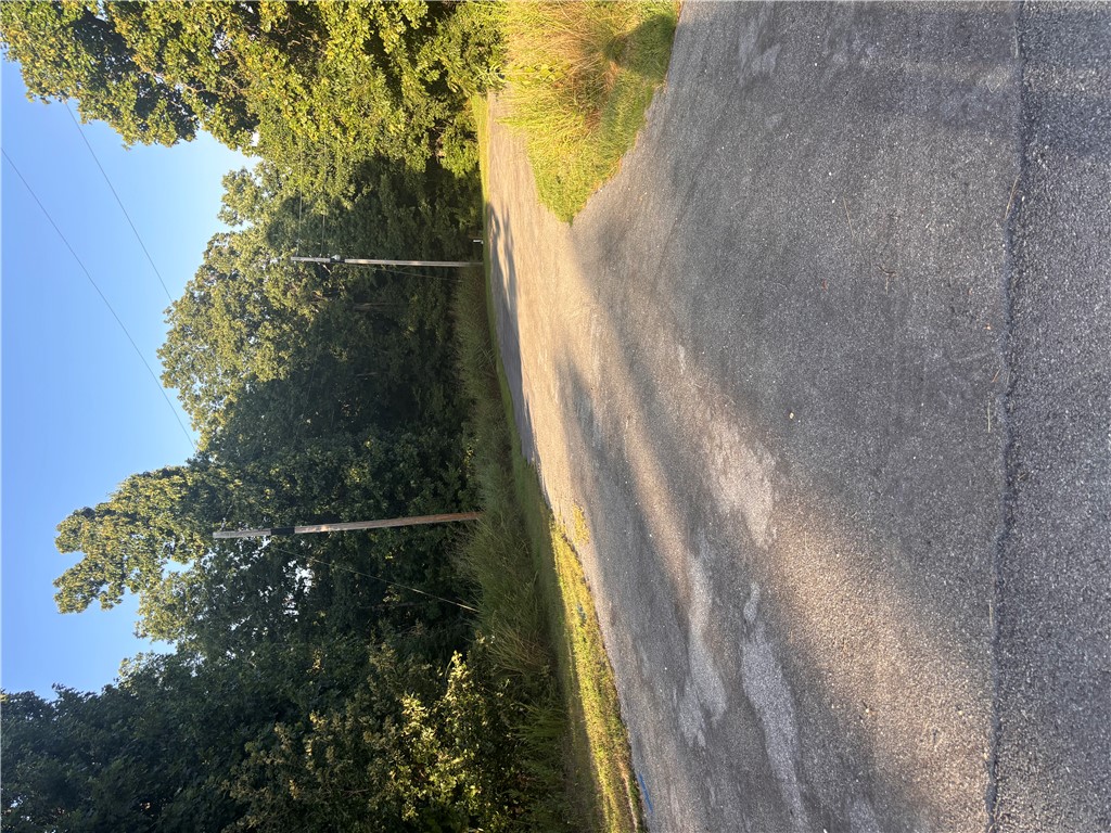 Conveniently located near the Back 40 Trail System, this property is ideal for mountain biking, hiking, and enjoying Northwest Arkansas' renowned outdoor lifestyle. You're also just minutes from Metfield Park, featuring a swimming pool, tennis and pickleball courts, playgrounds, disc golf, and additional recreational facilities. Golf enthusiasts will appreciate the close proximity to Kingswood Golf Course, while nearby Lake Brittany offers opportunities for kayaking, fishing and peaceful lakeside relaxation. Everyday conveniences are just a short drive away, with easy access to Highway 71, providing a quick commute to Bentonville, Walmart Home Office, shopping, restaurants, and all the attractions of Northwest Arkansas. Don't miss the chance to own a piece of Bella Vista and enjoy everything this vibrant outdoor destination has to offer!