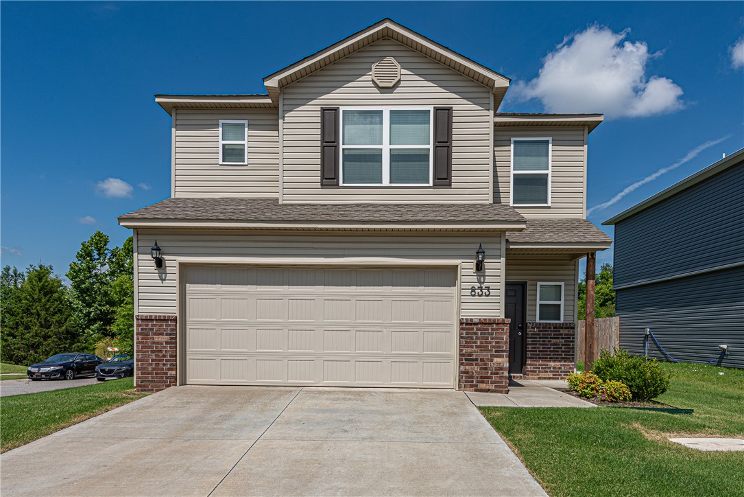 Welcome HOME! This well-maintained 3 bedroom, 2.5 bathroom home on a corner lot is located near shopping, dining, parks, and just minutes away from I-49 and the University of Arkansas! From the covered front entry, head inside to an inviting open-concept living area featuring luxury vinyl plank flooring and ample windows providing abundant natural light. Enjoy the spacious kitchen with granite countertops, stainless steel appliances, ample cabinetry, pantry, and a large island that opens to the dining area, perfect for everyday living and entertaining! Upstairs, you'll find a flex space providing endless possibilities. Right down the hall, retreat to the primary suite featuring a private ensuite bath with a walk-in shower and generous closet space. Enjoy two additional bedrooms and a pass-through bathroom. Head out back to the patio and enjoy the backyard with no home directly behind & separation on one side creating a more secluded backyard setting perfect for relaxing. Don't let this opportunity pass you by!