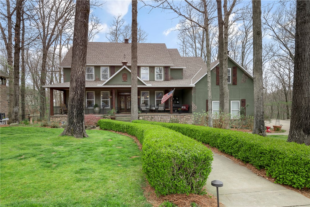 Rare Find! Amazing home in North Bentonville’s Hidden Springs Neighborhood on a beautiful 1.13 wooded acre lot with direct access to “Tristan’s Trail” and all North Bentonville Mountain Biking Trails! Elegant and Spacious home featuring 3 levels, 7BRs, 4.5BAs, Den/Office, Formal Dining, Hearth Room, Bonus Room. Perfect home for a large family or if you love to entertain guests! Upper and Lower decks overlook wooded area perfect for enjoying a moment of peaceful escape in the middle of town, and koi pond to enjoy from your covered front porch. If you are an avid mountain biker/trail runner, you can’t get any closer to the trails than having access out your back door. Perfect home and perfect location-hurry to make it yours! Minutes away from Downtown Bentonville, Museums, Walking Trails, Schools and 1-49 for easy access to all things Northwest Arkansas!   Kitchen Island does not convey.  Sellers prefer an early/mid-June closing date.