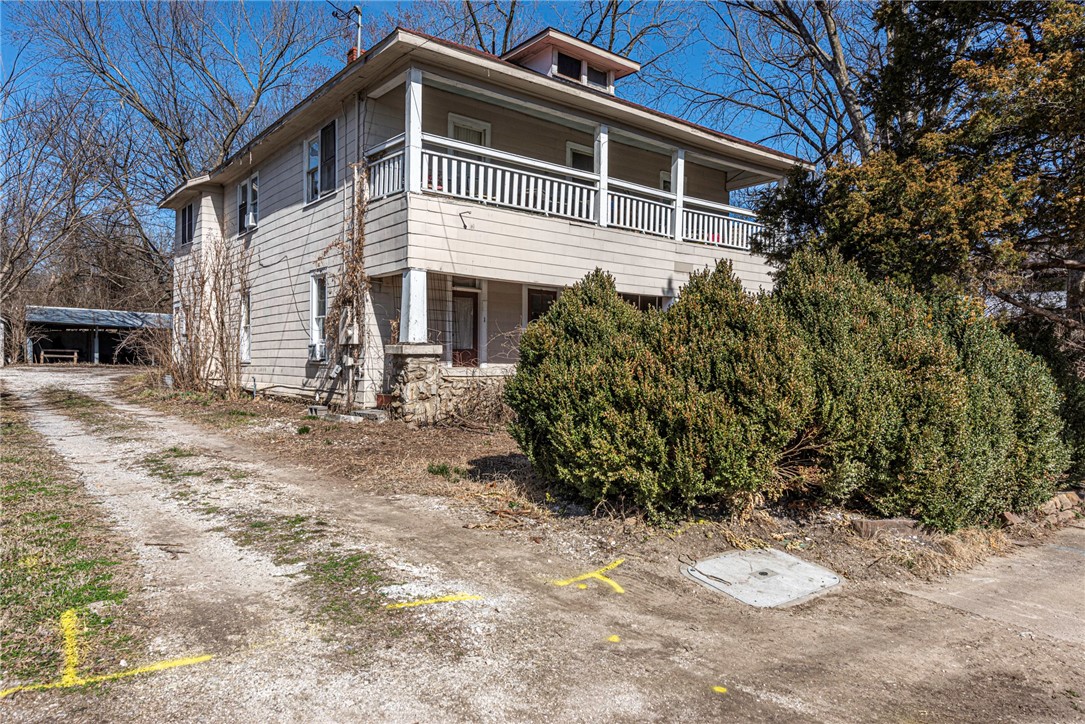 LOCATION LOCATION LOCATION! This 0.16-acre lot is exactly what you’ve been looking for! Located just minutes away from schools, shopping eateries, parks, Downtown Fayetteville, the Frisco Trail and the University of Arkansas! The existing home on the propert built in 1890 and could be your next fixer-upper dream renovation! Not looking for renovation and want to start from scratch? This lot is zoned Residential-Office (R-O) and has the potential for Government facilities, Single-family dwellings, Two-family dwellings, Limited business, Offices, studios, and related services with conditional use possibility including multi-family dwellings!  Home is being sold "as-is" will not go FHA or VA loans. In-House Loans or Cash Only.