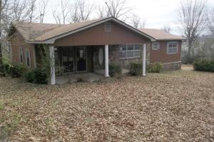 Large spacious rooms with huge dining room, large laundry, gas log fireplace, fenced yard, deck & end of the street location. All #'s are approx, age is an estimate, square footage per assessors card. Selling ''As-Is''. Buyer to verify existence of septic.