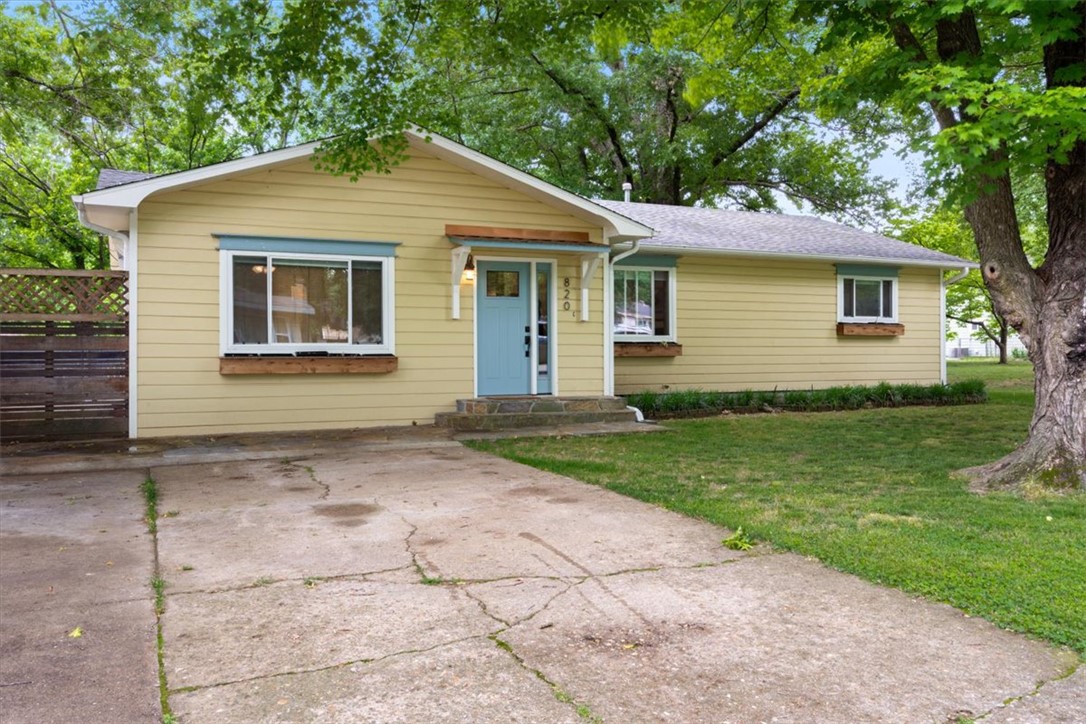 Gorgeously remodeled in 2020, this beautifully updated home blends vintage charm with modern convenience in a prime location close to downtown Siloam Springs. Featuring an open concept layout with a desirable split floor plan, the home is filled with stylish upgrades including butcher block countertops, custom tilework, and an adorable copper-covered front porch. Enjoy entertaining indoors or relaxing outside in the large, shaded, fenced backyard. Major system updates provide peace of mind, including a new roof in 2021, new hot water heater in 2020, all-new PEX plumbing, approximately 60% of the home professionally rewired, new gutters with leaf guards, and a new HVAC system installed in 2025. Bike to downtown, shopping, dining, and more while enjoying the character and charm this unique property has to offer. This is the one you’ve been waiting for!