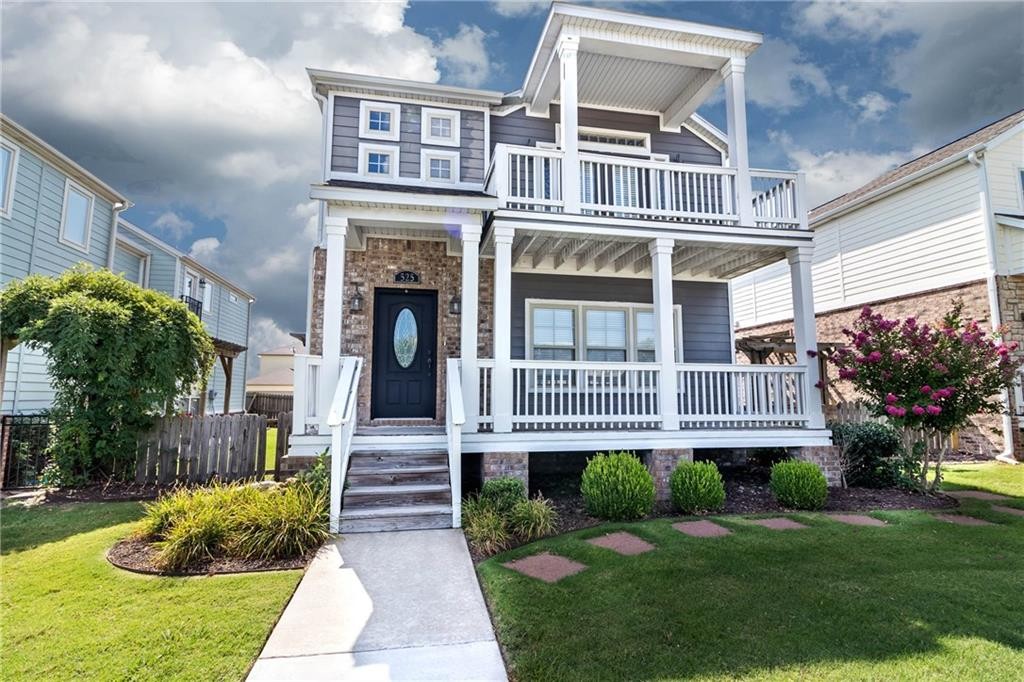 Welcome to Rupple Row, a thoughtfully designed 3-bedroom, 2.5-bath home featuring a spacious open floor plan and hardwood floors throughout. The kitchen offers granite countertops and flows into living areas centered around a gas fireplace. The large master suite includes private balcony and a relaxing jacuzzi tub. A two-car garage provides convenient parking and storage. Located right across from the Greenway Trail and just minutes from the University of Arkansas, this property sits directly across from the Boys and Girls Club and close to all that Fayetteville has to offer!