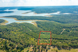 Lake View!  Short drive to 125 Marina.  Great building site. South line joins U.S. Army Corp. of Engineers.