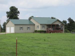 Very nice newer home. Just off pavement & down a peaceful country land, perfect for a hobby farm, horses, etc. 3 bed 2 bath with a huge shop/garage and outbuildings. Peaceful setting.