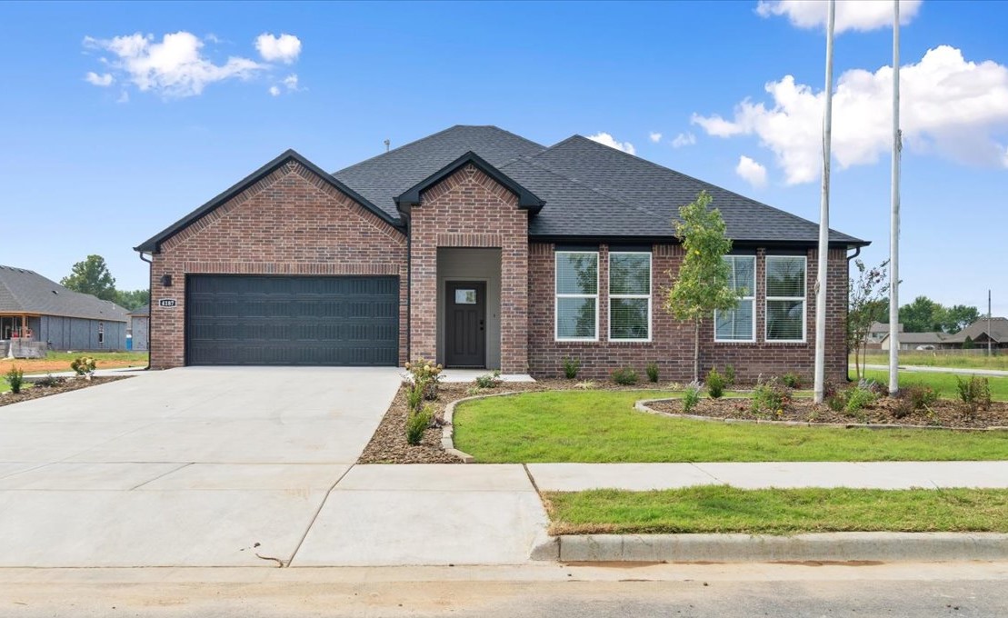 Sold before print! Dashing Dean Plan in Brentwood Village, located in Springdale, close to the C.L. "Charlie" and Willie George Park that consists of walking trails, dog park, splash pad, ball fields, and tennis courts close to the Don Tyson Parkway, near the highly sought-after Don Tyson School of Innovation and other schools. These brand-new homes will be 4-sided Brick! Living room will showcase a beautiful and modern Electric Fireplace with Poplar Mantle. Home will have LVP and Carpet. Kitchen will have 42-inch cabinets, lovely appliances and quartz countertops and tile backsplash. Ceiling fans in Bedroom one and the living room. Primary bedroom has a fabulous ensuite with a walk-in shower and elongated quartz countertops. LED lighting throughout. High efficiency AC with programmable thermostat. Come find your dream home today! Taxes and Parcel TBD.