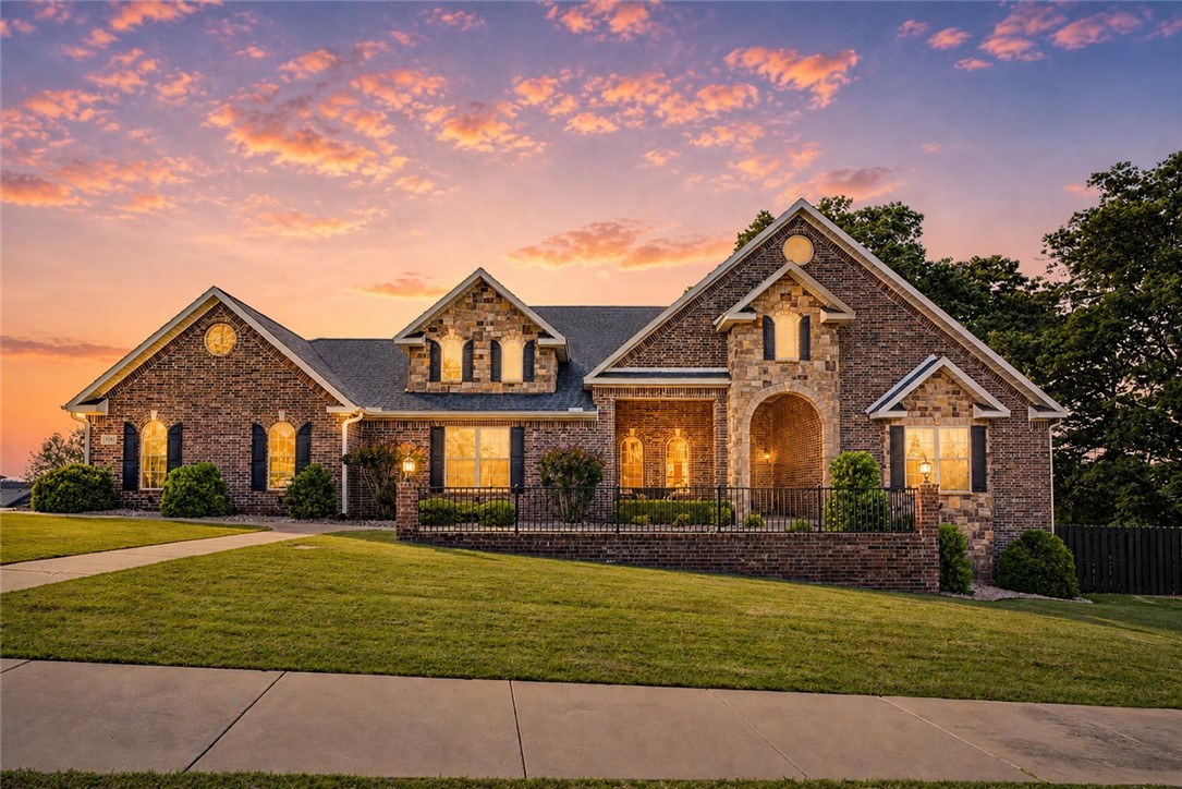 Experience luxury living in this stunning 4-bedroom, 3-bathroom home with three car garage offering 3,560 square feet, primarily on one level, of thoughtfully designed space in one of Bentonville’s most desirable locations. Step inside to discover expansive living areas filled with natural light, soaring ceilings, and
upscale finishes throughout. The show-stopping kitchen is the heart of the home, three ovens, two dishwashers, beverage bar, abundant prep space, and a walk-in pantry. Each bedroom includes a large walk-in closet and individual HVAC climate control. The primary suite offers a peaceful retreat with spa-like amenities and generous storage. Outside, enjoy the in-ground pool, multiple outdoor living spaces, and breathtaking views that create the perfect setting for relaxing evenings & entertaining. Located minutes from OZ Bike Park and the Razorback Greenway trail system. 10 minutes to Walmart home campus.