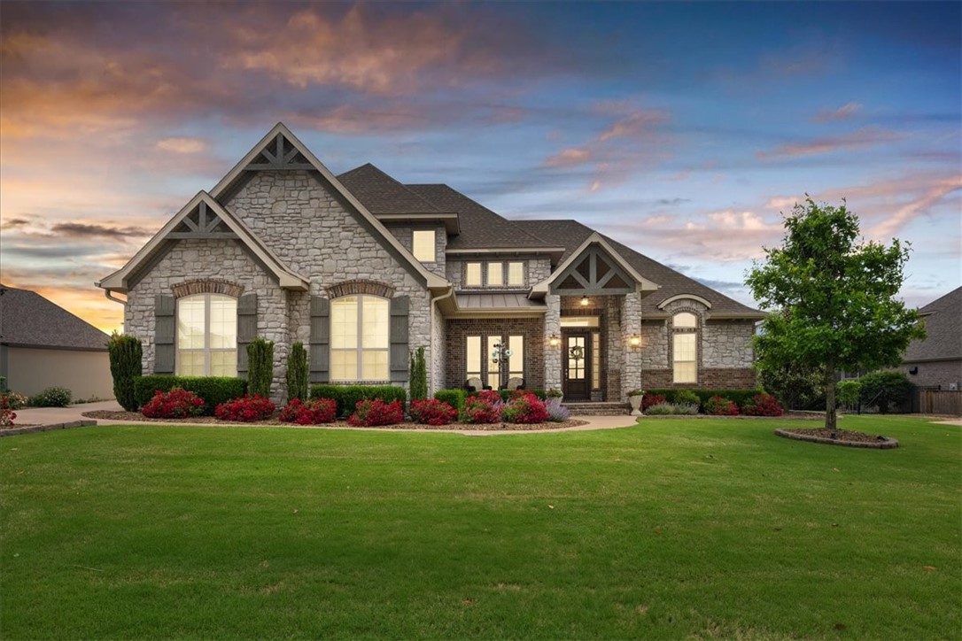 Discover this stunning home nestled in the highly sought-after Otter Creek community. Situated on a spacious half-acre lot, this residence offers five bedrooms, three and a half baths, a formal dining area, a dedicated office, and a versatile bonus room—perfect for family living and entertaining.
Relax and entertain on the large, covered, screened-in back porch, featuring a cozy fireplace. The backyard oasis includes an in-ground pool, all surrounded by privacy trees for a tranquil retreat. This exceptional property combines luxury, comfort, and outdoor enjoyment in a sought-after neighborhood.
The open floor plan is bathed in natural light, thanks to an abundance of windows that showcase beautiful views throughout the home. Inside, you'll find a sophisticated color palette complemented by gorgeous hardwood floors and granite countertops, creating a perfect home.