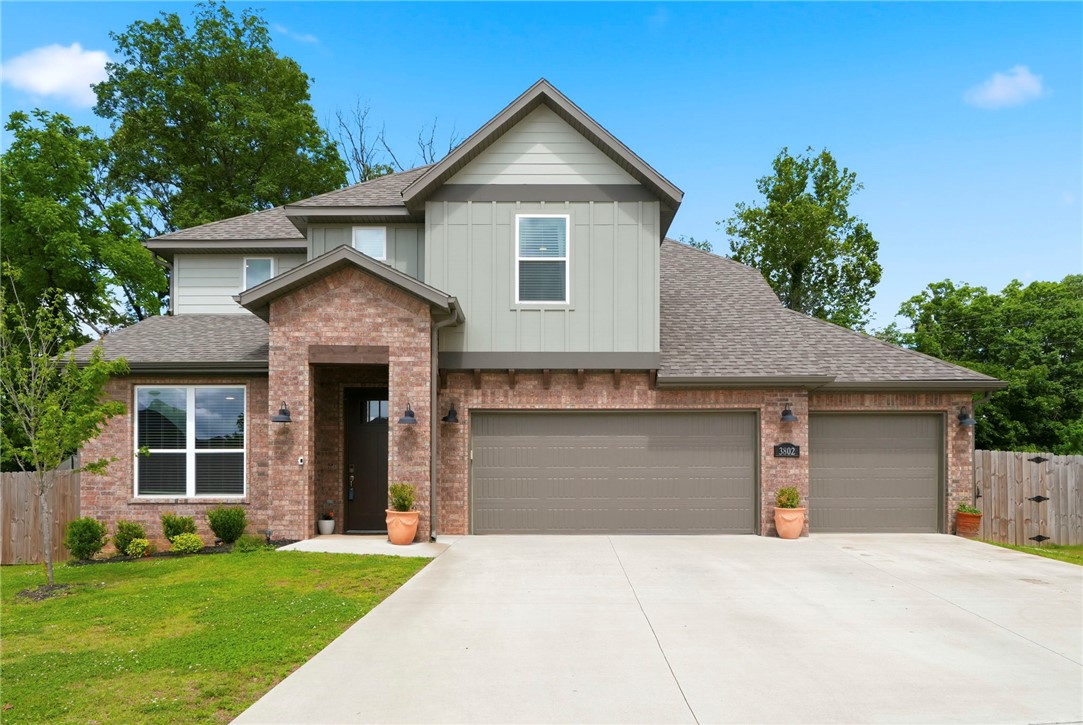 Tucked away in a sought-after Bentonville neighborhood just minutes from downtown and 6 miles from Walmart Home Office, this 4-bedroom, 2.5-bath home delivers comfort, style, and function. The open layout showcases cathedral ceilings, luxury vinyl plank flooring, quartz counters, and a cozy gas fireplace in the living room. The kitchen is chef-ready with a gas range, pantry, and eat-in dining. The primary suite features a walk-in shower, and a dedicated office/study adds flexibility for today's buyer. Dual HVAC systems, a 2024 roof, and a 3-car attached garage bring lasting confidence. Out back, Little Osage Creek runs along the property — enjoy the covered patio, private garden area, and an 80 sq ft detached building. Wood privacy and iron fencing, a storm shelter, security system, and keyless entry round out this well-appointed home. POA annually. Schedule your showing today!