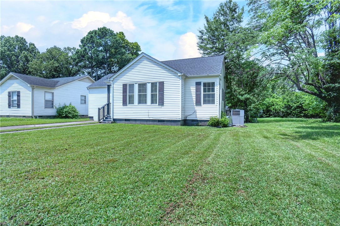 Are you having difficulty finding an affordable house that does not need a complete overhaul?? This is your lucky day!! This home that is centrally located in Russellville is ready to go today. New roof in 2020, new, hvac in 2024and new flooring in 2026. It has three bedrooms, two full baths and a large kitchen that is open to the living room. Outside there is a big fenced back yard.  The only thing left to do is move in and start enjoying life.