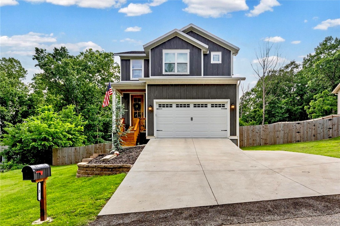 Tucked into a peaceful neighborhood with a partial view of Loch Lomond, this light-filled 3BR/2.5BA home offers the perfect mix of comfort and fun. The open kitchen and living area make everyday living and entertaining easy, while large windows bring in tons of natural light. Enjoy watching boats come and go from nearby Tiree Park, relax in the hot tub that may convey, or spread out in the large fenced backyard. Conveniently located with easy access to the Bella Vista Bypass and all the amenities Bella Vista has to offer!