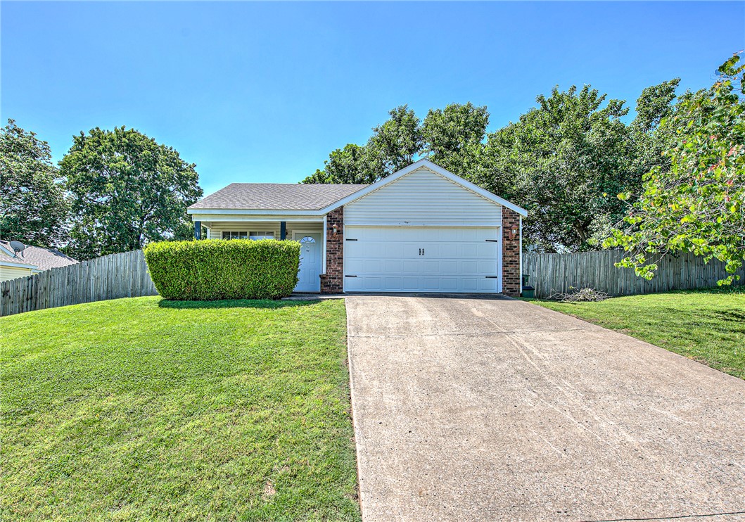 Move-in ready and full of potential, this home is perfect for first-time buyers, students, or investors! Conveniently located just minutes from the University of Arkansas campus and near local favorites like Bryce Davis Park, Iams Dog Park, and the Hamestring Creek Trail, this location offers easy access to recreation, dining, and everyday conveniences.
Inside, you’ll find comfortable living spaces and a spacious primary suite featuring an oversized closet and ensuite bathroom. The large, fully fenced backyard is ideal for pets, entertaining, or relaxing outdoors, complete with a patio and low-maintenance siding for easy upkeep. Recent updates include a new roof in 2021, plus a new front door and garage door, adding both value and curb appeal. Whether you’re looking for your first home, a game-day retreat, or an investment opportunity, this property is ready to welcome its next owner!