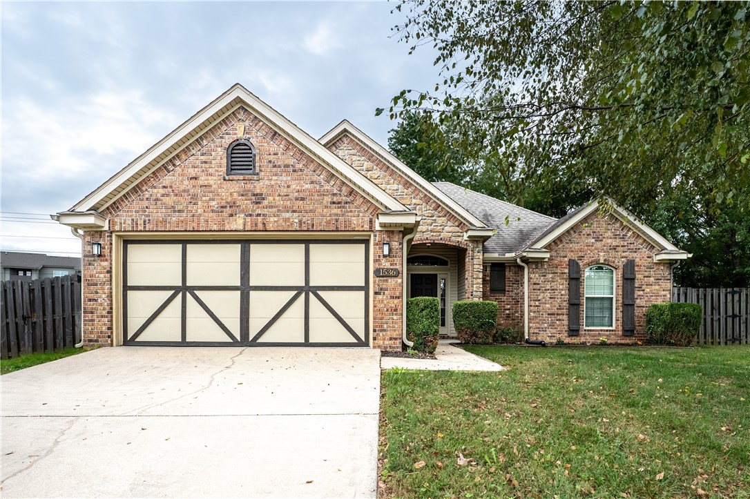 Spacious 3 bedroom 2 bath home with updated lighting and carpet throughout. Open living room with gas fireplace. Master bathroom has double vanity and walk in shower as well as a tub. Shaded back and front yards on a Cul de sac lot with easy access to I-49 and University of Arkansas campus.