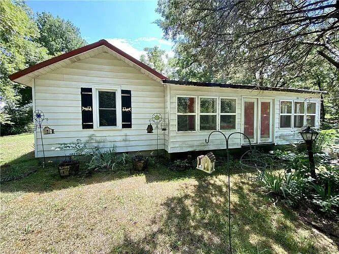 Fixer Upper with lots of potential in a great location! This 3 bedroom, 2 bathroom Springdale home sits on about 2 acres of land. The home also features a sunroom. Down the street from Wal-Mart Supercenter and right off of I-49. This location has quick access to all of the amenities that NWA has to offer!