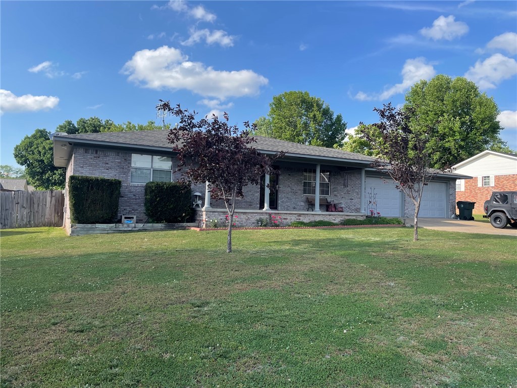 Well maintained Brick Home with 2 car attached garage. Fenced in back yard and a small storage building conveys. Home has a Lodge like atmosphere with wood laminate floors. 1668 sq. feet of living area with a large living room and it is designed with wide hall ways and doors. Handicap assessable featuring a walk in showing. Open kitchen to Dining area and a large Pantry. Master bedroom has a bathroom and walk in closet. Total of 3 bedrooms and 2 bathrooms. Above ground pool that is located in the backyard conveys with property. Large back deck with covered roof is a great place to relax in the morning or evening. Over all a great Home.