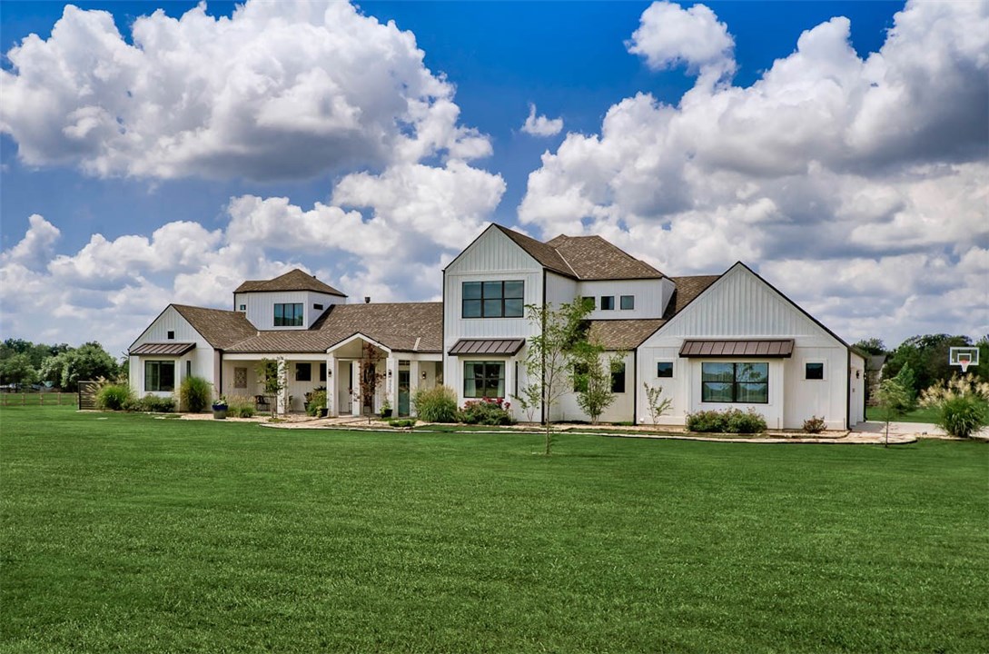 6.42 acres in great SW Bentonville location! This gorgeous newer home has open floor plan & is located close to approved new Bentonville schools!  Come enjoy your stocked fish pond w/aerator & even bring your horse all this just minutes from Walmart home office, Pinnacle Promenade & the Airport.   Home is filled w/designer features including Modern Linear Natural gas fireplace, designer carpet, steam shower with dual zones, custom quarter-sawn Oak cabinets, In-counter Gaggenau Steamer, 2 Bosch DW, 36" induction cooktop & Bosch convection oven, Separate built-in look Refrigerator & Freezer, central vac system w/in wall hose system. Home also features oversized bedrooms w/on suite baths, 4 car oversized garage, whole house generator & tons of storage.  See attachment for additional list of amenities.