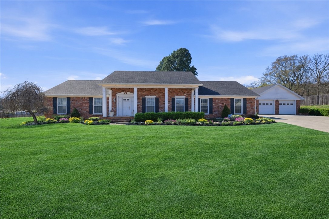 Completely transformed from top to bottom, this beautifully remodeled home sits on a spacious .49-acre lot in one of Fayetteville’s most desirable neighborhoods. Walls were thoughtfully reconfigured to create an open-concept living and kitchen space that flows seamlessly to a stunning new covered patio with glass doors—perfect for indoor/outdoor living and entertaining.
The home features new wood flooring throughout the main living areas, complemented by stylish modern tile in the bathrooms. The redesigned kitchen includes all-new cabinetry, modern backsplashes, a bar area, and new appliances. The primary suite has been reimagined with an incredible new bathroom and an expanded closet.
Updated fixtures and finishes throughout complete this top-to-bottom renovation. Still time for you to select some finishes, including colors, flooring & tile if you're quick! New plumbing, electric, ductwork and insulation. Primary & Living are cell spray foam insulation. 1 A/C is 1.5-year, furnace is 5.5 yrs and roof 5.5 years.
