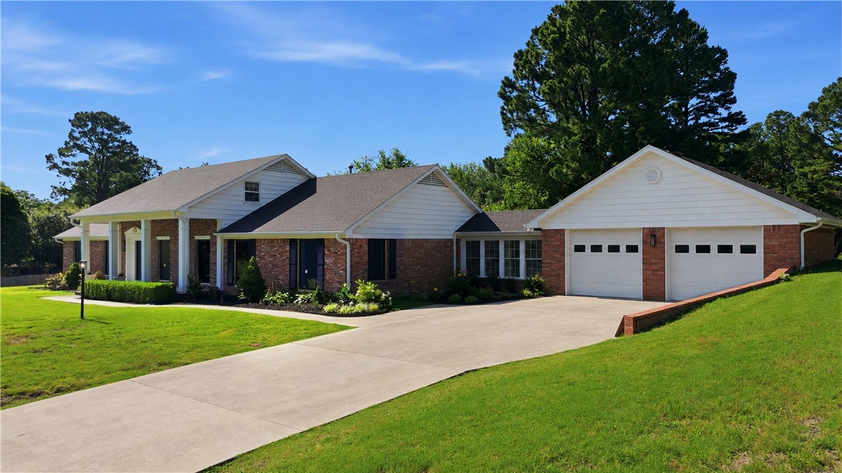 Completely transformed from top to bottom, this beautifully remodeled home sits on a spacious .49-acre lot in one of Fayetteville’s most desirable neighborhoods. Walls were thoughtfully reconfigured to create an open-concept living and kitchen space that flows seamlessly to a stunning new covered patio with glass doors—perfect for indoor/outdoor living and entertaining.
The home features new wood flooring throughout the main living areas, complemented by stylish modern tile in the bathrooms. The redesigned kitchen includes all-new cabinetry, modern backsplashes, a bar area, and new appliances. The primary suite has been reimagined with an incredible new bathroom and an expanded closet.
Updated fixtures and finishes throughout complete this top-to-bottom renovation. Still time for you to select some finishes, including colors, flooring & tile if you're quick! New plumbing, electric, ductwork and insulation. Primary & Living are cell spray foam insulation. 1 A/C is 1.5-year, furnace is 5.5 yrs and roof 5.5 years.