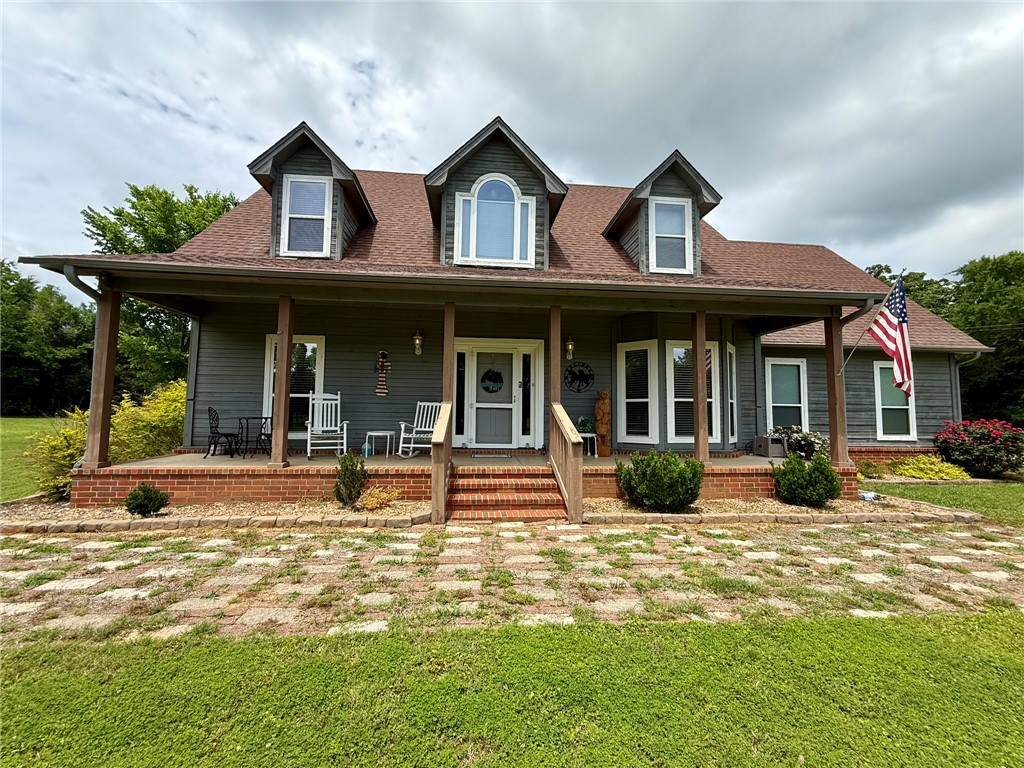 Welcome to your own private slice of heaven! Nestled on 3 beautiful acres in a quiet, friendly neighborhood, this beautiful two-story home offers the perfect blend of comfort, space, and versatility. With 4 bedrooms, multiple living areas, and flexible bonus spaces, there’s room for everyone to feel right at home.

The main level features a spacious living room, dining area, and kitchen ideal for everyday living and entertaining. You’ll also find 2 bedrooms. Upstairs offers 2 additional bedrooms, including the primary suite, plus a second living area perfect for a game room, media room, or cozy retreat.

Step outside and enjoy peaceful country views from the covered back deck or coffee on the front porch. Garden enthusiasts will appreciate the extra space, while hobbyists and outdoor lovers will love the large 24x26 workshop and oversized carports with room for RVs, boats, recreational equipment, and additional vehicles.
