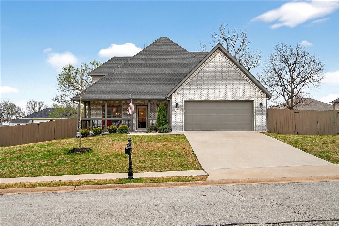 SELLER Offering Up To $2,500 Toward Buyers Closing Costs. Built in 2020 and beautifully maintained, this stunning 4-bedroom, 2.5-bath home in Pea Ridge offers modern comfort. Designed with both everyday living and entertaining in mind, the open-concept floor plan welcomes you with wood flooring and a gorgeous stone gas-log fireplace. The kitchen is both functional and stylish, featuring granite countertops, shaker cabinetry, stainless steel appliances, separate gas cooktop, built-in oven and microwave, and a large center island with seating. The dining area opens to the covered back patio, fenced backyard, and a beautiful stone fire pit perfect for relaxing or entertaining. The primary suite features a walk-in closet, jetted tub, and tiled walk-in shower. The additional bedrooms provide room to grow, host guests, or create the perfect office setup. Located close to schools, parks, trails, and dining, this home combines quality, convenience, and charm in one exceptional property. Come see all this home has to offer!