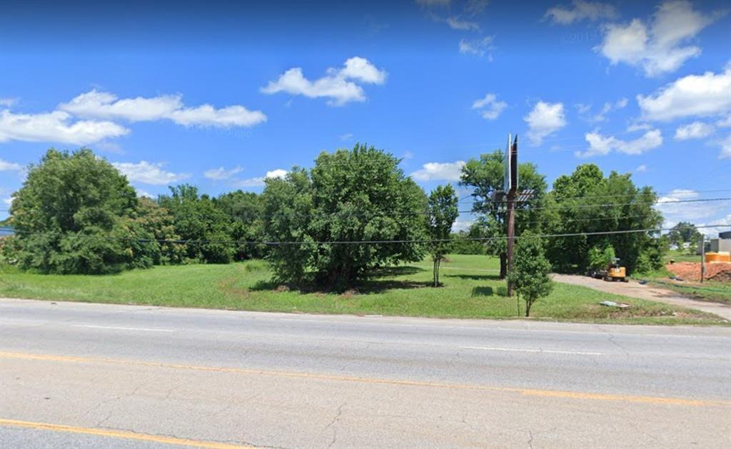 Generally level and rectangular ~ 2.50-acre parcel located along a busy commercial corridor in north Springdale.  All utilities are available.  Zoned C-5 with excellent visibility.  Average daily traffic count of approximately 26,000 VPD on N Thompson St.  Approximately a 5-minute drive to I-49 at Wagon Wheel Road and ~ 4-minute drive to the future interchange of the next phase of the proposed Springdale Northern Bypass.  Survey included in the attachments.
