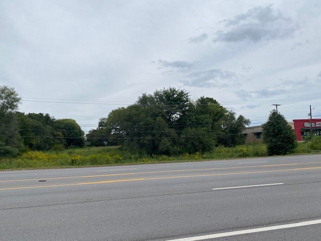 Generally level and rectangular ~ 2.50-acre parcel located along a busy commercial corridor in north Springdale.  All utilities are available.  Zoned C-5 with excellent visibility.  Average daily traffic count of approximately 26,000 VPD on N Thompson St.  Approximately a 5-minute drive to I-49 at Wagon Wheel Road and ~ 4-minute drive to the future interchange of the next phase of the proposed Springdale Northern Bypass.  Survey included in the attachments.