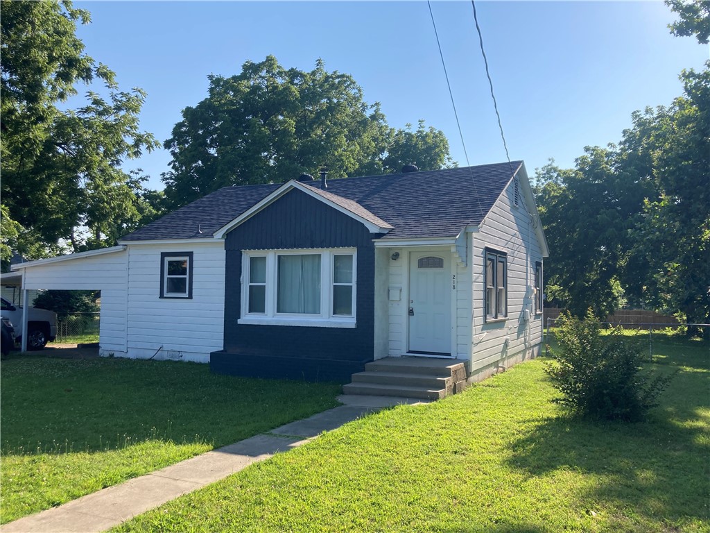 Updated and well maintained 2 bedroom 1 bath cottage with a carport.  Wood-like vinyl planks throughout and fresh paint.  Enjoy the spacious yard and privacy that this home offers.  This home comes with a Refrigerator, Washer & Dryer.  Pets are negotiable with management approval.  Rents for $1200 a month with a $1200 Refundable Security Deposit and a $250 Refundable Pet Deposit.