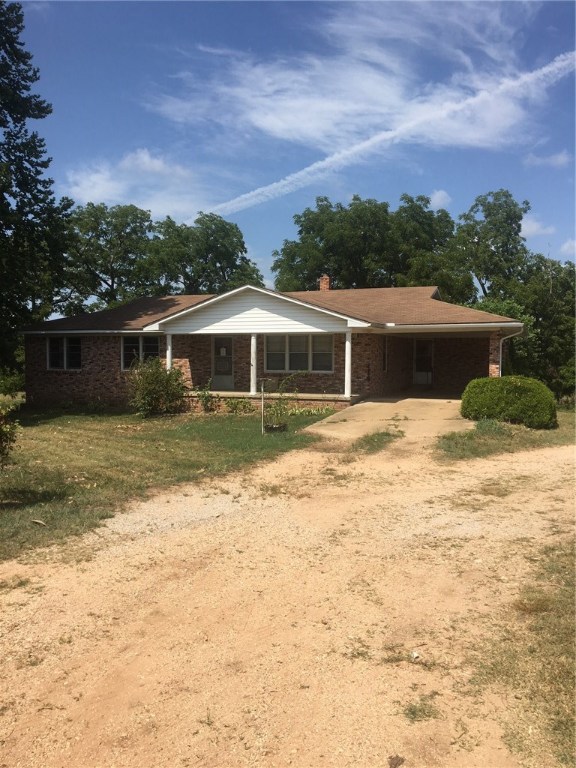 Main level 1,612 sq. feet Brick home with 1,500 sq. in basement area. 2 acres with outbuildings.
