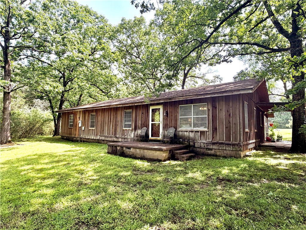 Peaceful country living on 20 acres! This 4-bedroom, 2-bath home offers privacy, space, and beautiful natural surroundings with wooded acreage and open areas around the home. Well-maintained and full of charm, the home features a bright sunroom with a light, airy feel—perfect for enjoying morning coffee or taking in the views. Outdoors, enjoy an above-ground pool with deck, a back patio overlooking the yard, and plenty of room to relax and enjoy the outdoors. Wildlife is often seen roaming the property, adding to the peaceful country setting. If you’ve been looking for room to roam and quiet country living, this property is a must-see. Schedule your showing today!