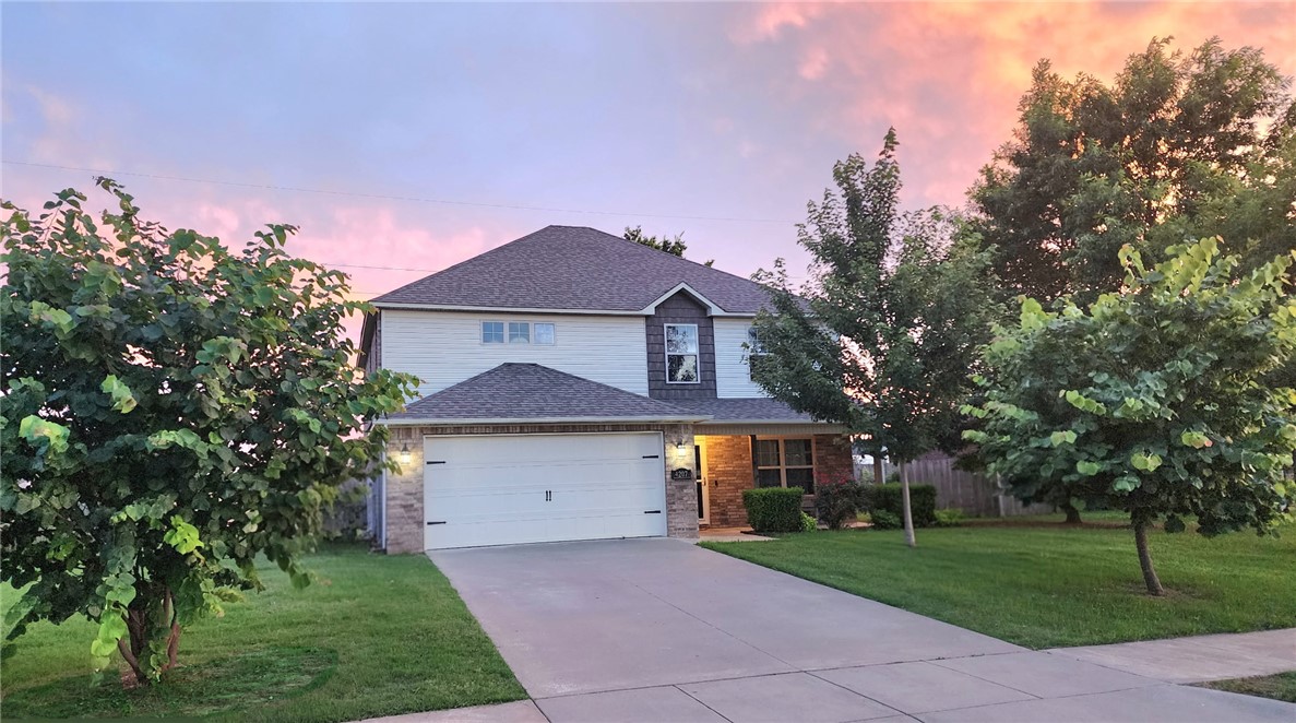 Rare Bentonville 4BR with NO HOA on a flat 1/3 acre lot - primary suite downstairs plus oversized bonus room and quick access to Schools, Trails, Food, Shopping, and Walmart Home Office Campus. 

Fresh updates include brand NEW carpet, fresh paint, and luxury vinyl plank flooring throughout the main living areas. Functional layout with the primary bedroom downstairs featuring two walk-in closets and oversized bedroom. Spacious living areas, and a large upstairs bonus room perfect for a second living space, office, playroom, or media room.

Enjoy the hard-to-find combination of a large usable flat backyard, mature trees, and a truly move-in ready interior. Central location — bike to Coler Mountain Bike Preserve and just minutes from schools, shopping, Walmart, the Bentonville business district, and the new Walmart Home Office.