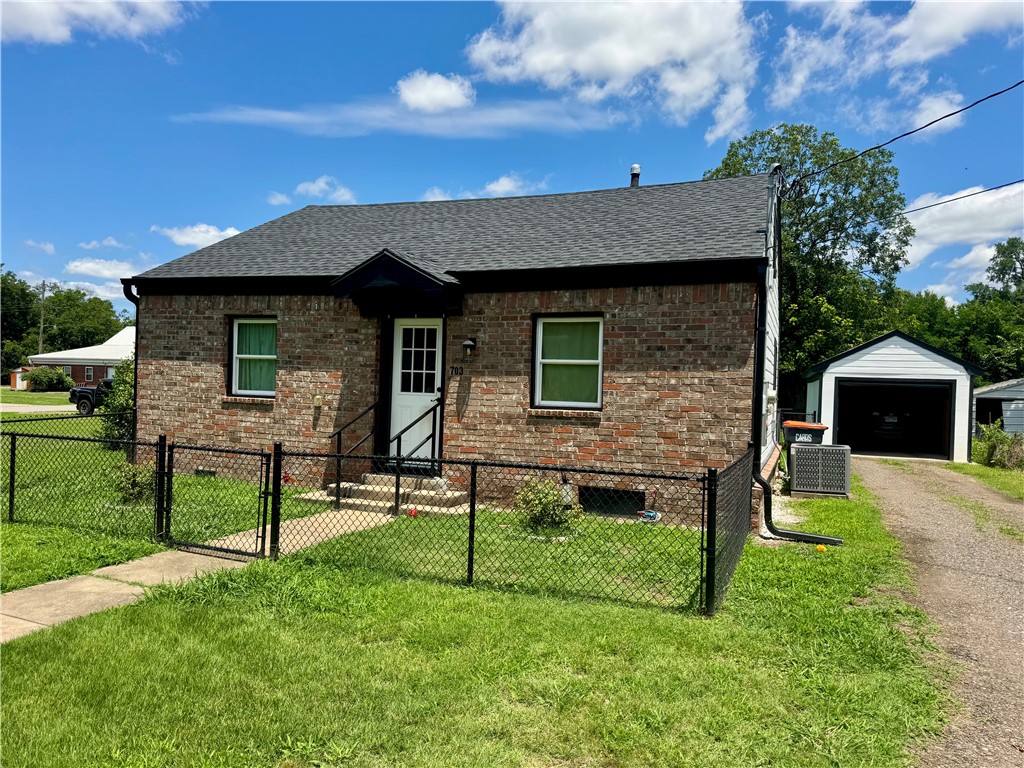 This move-in-ready 2-bedroom, 1-bath home offers 832 square feet of comfortable living space and was completely renovated in 2022. Major updates completed during the renovation include the roof, HVAC system, water heater, windows, and more, giving buyers peace of mind for years to come.

Inside, you'll find a functional layout featuring original hardwood floors in the living areas, tile flooring in the kitchen, granite countertops, stainless steel appliances, and a beautifully updated bathroom with a walk-in tiled shower.

Outside, the property includes a 252-square-foot detached shop, providing additional space for storage, hobbies, or a workshop. Conveniently located near schools, shopping, and local amenities, this home combines modern updates with classic charm in an established Russellville neighborhood.

Don't miss your opportunity to own this well-maintained and thoughtfully updated home!